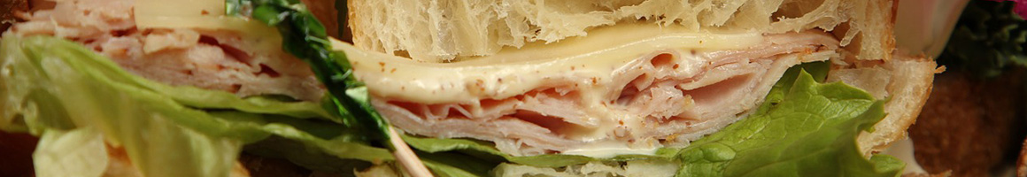 Eating Sandwich Cafe Salad at Sunset Cafe restaurant in Vero Beach, FL.